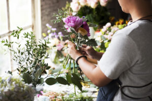 Florist Making Fresh Flowers Bouquet Arrangement